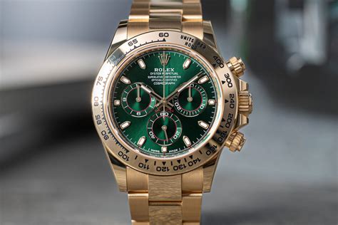 rolex daytona yellow gold on vip wrist